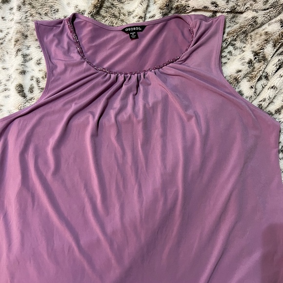 Sleeveless blouse. Purple with beads.